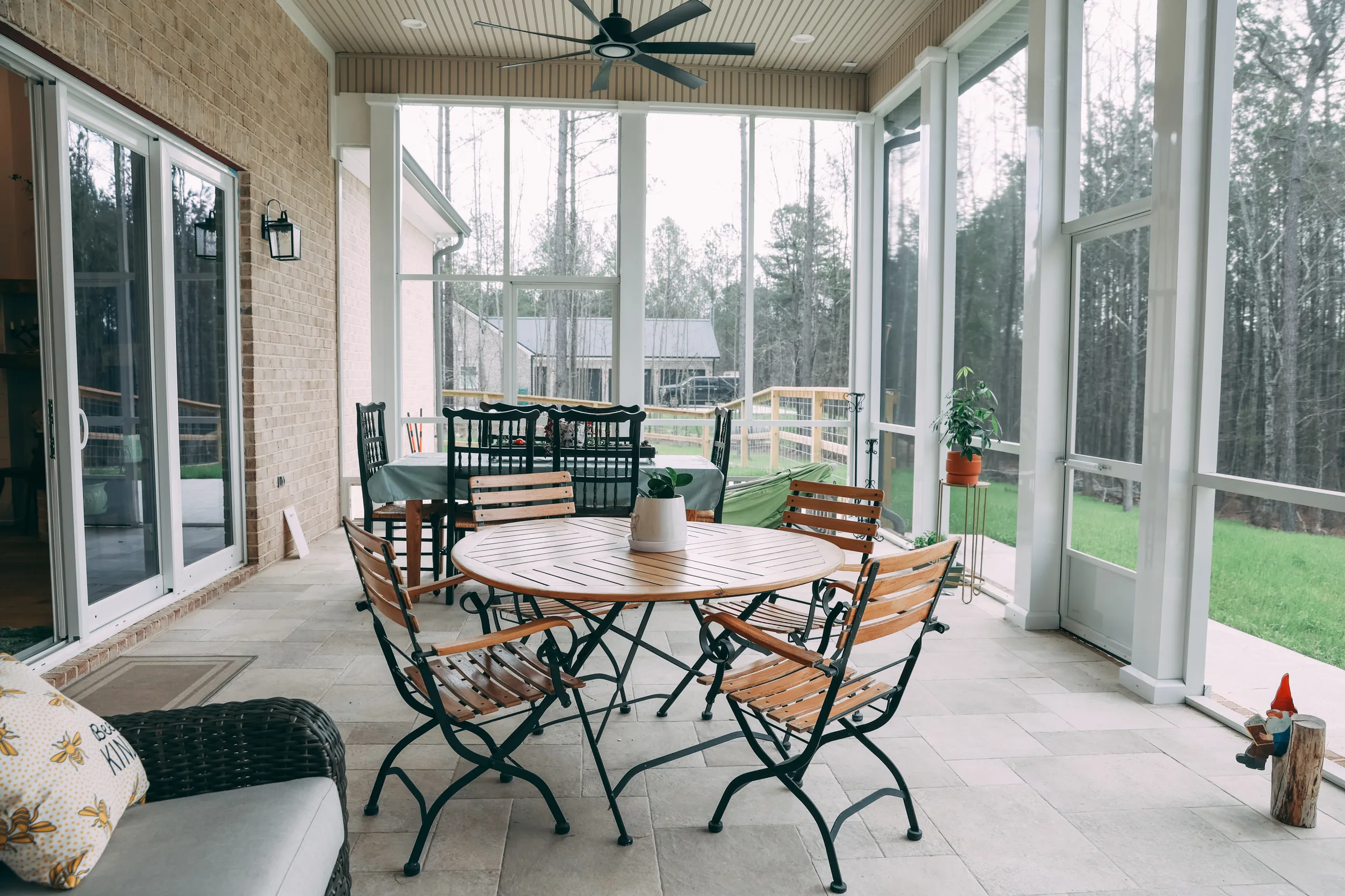 Attached patio cover shading outdoor living space on a Waterstone home